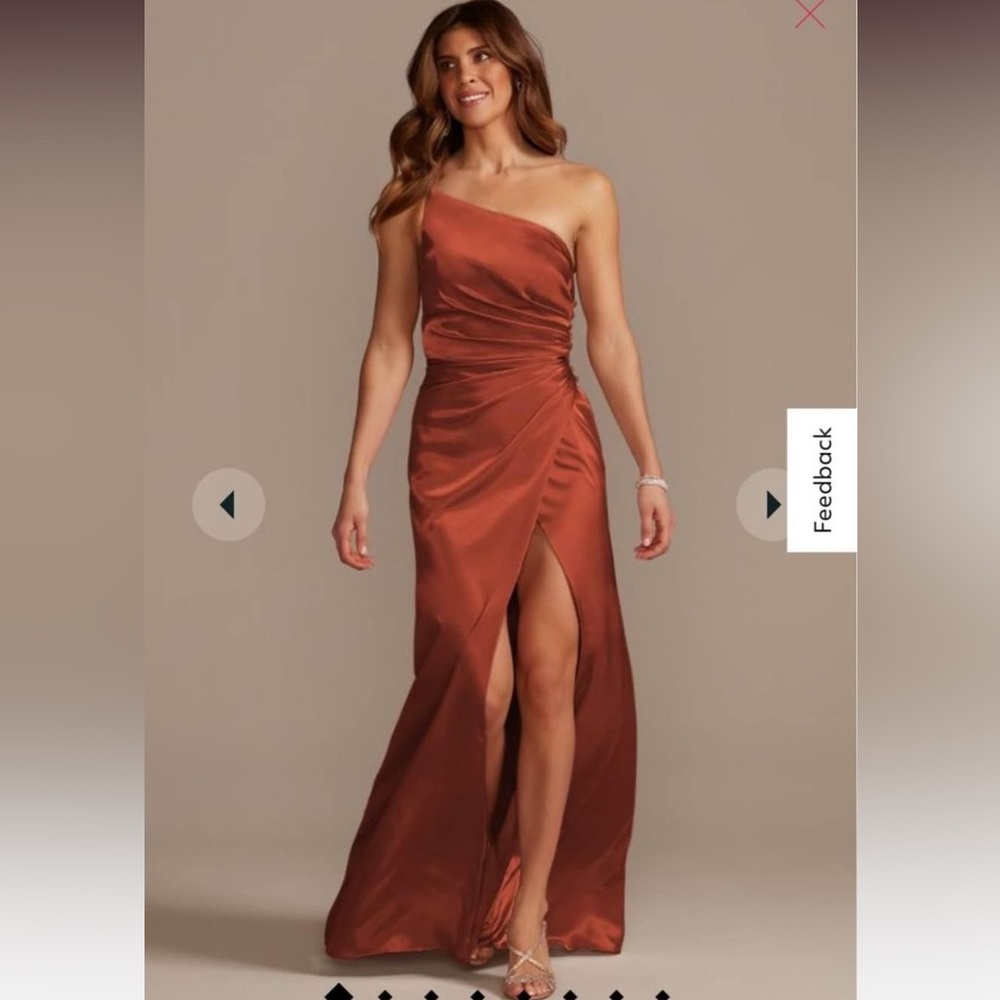 Never worn dress from David’s Bridal. No alterations done!